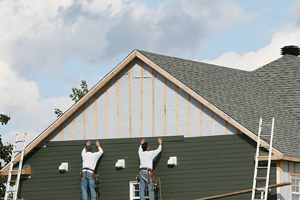 Professional Fiber Cement Siding technician working in Mentcle, PA